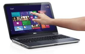 Picture of a touchscreen laptop and a person touching the screen