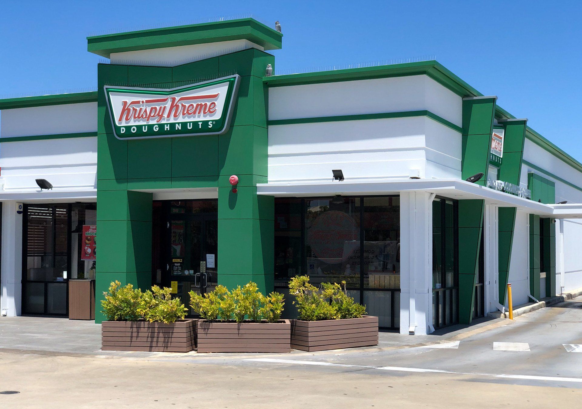 green and white render of the outside of krispy kremes painted by ABC Paint & Deco