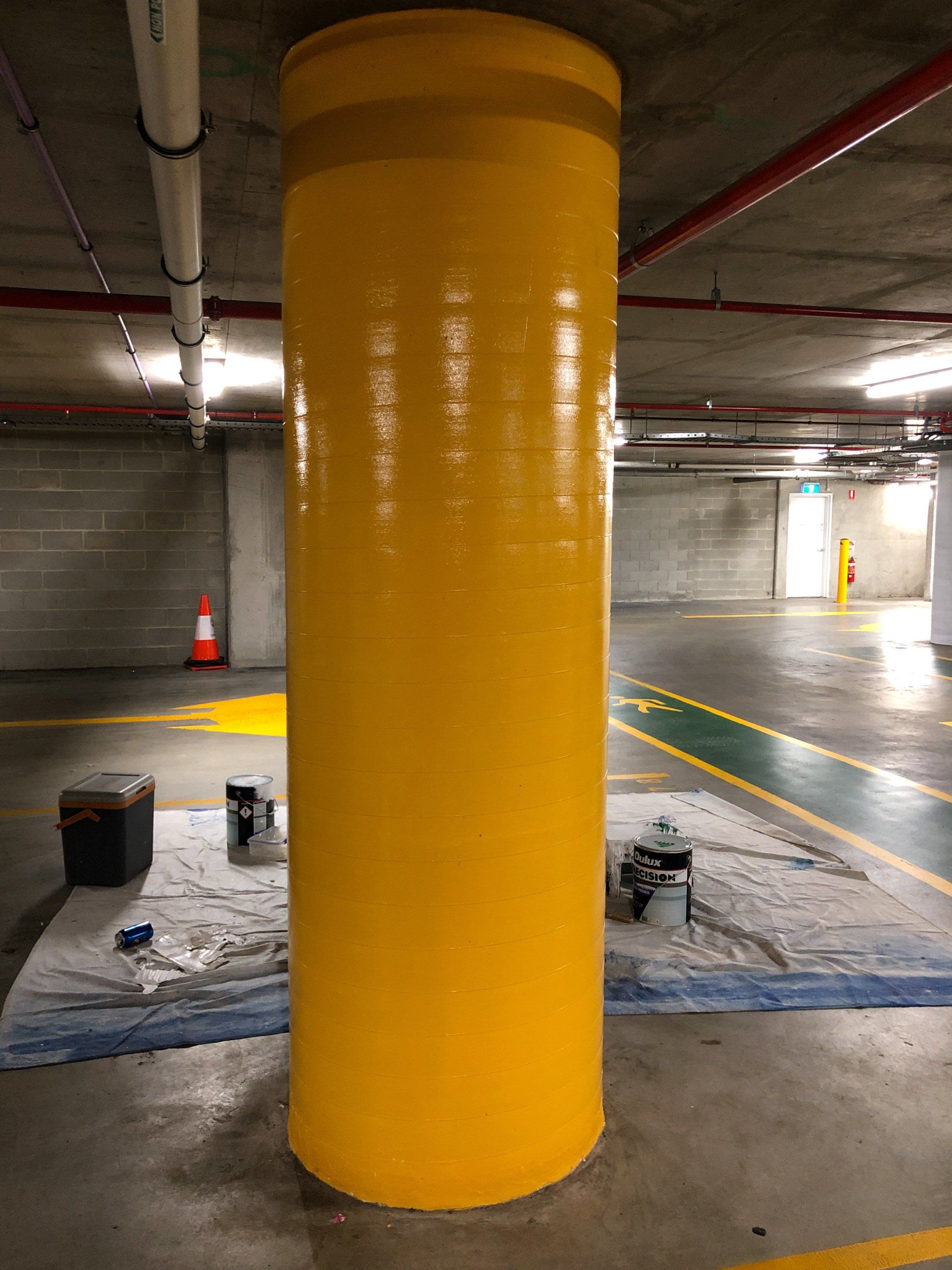 underground car park pillar plainted yellow by ABC Paint & Deco
