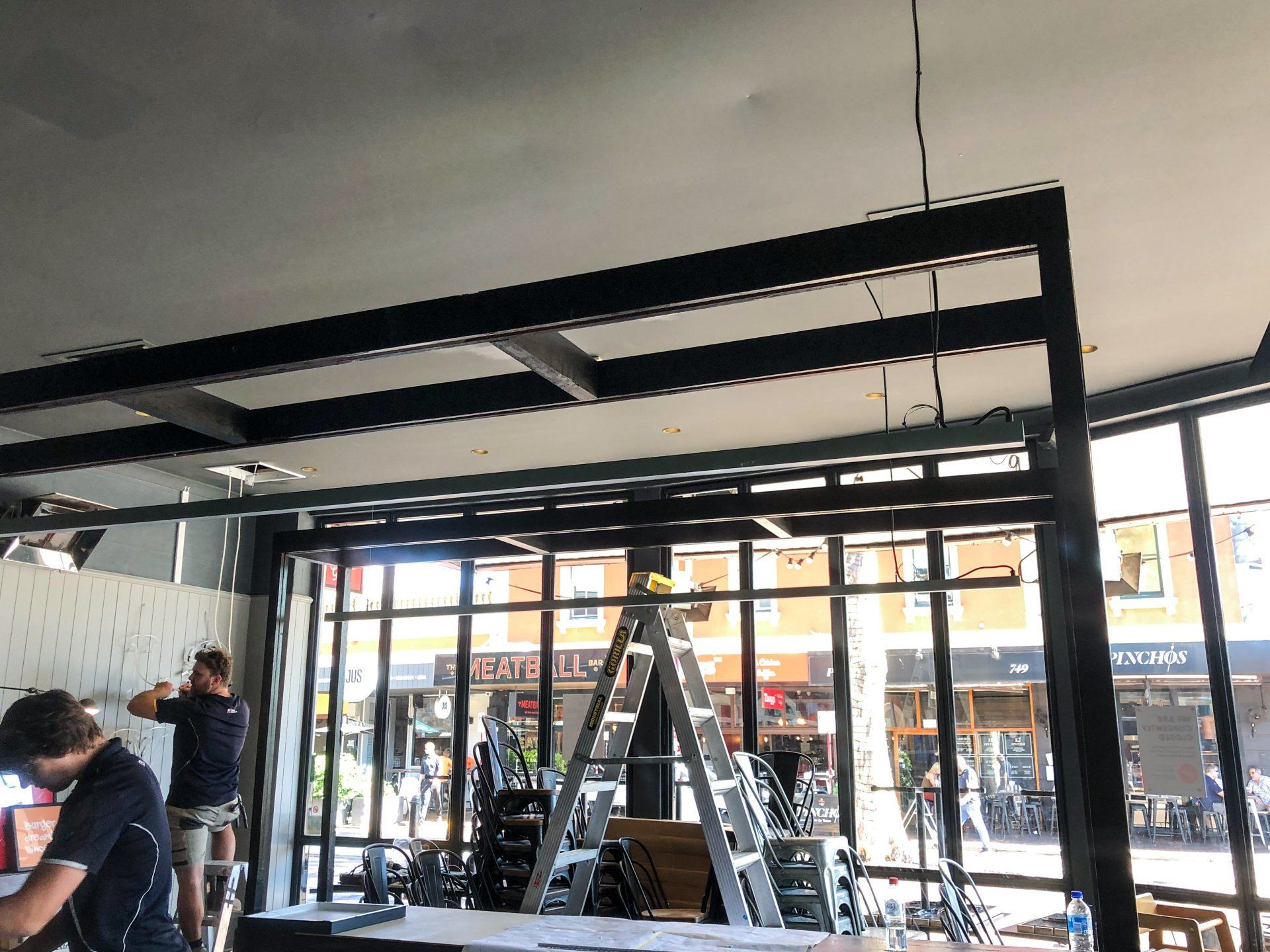 black display stand inside cafe painted by ABC Paint & Deco