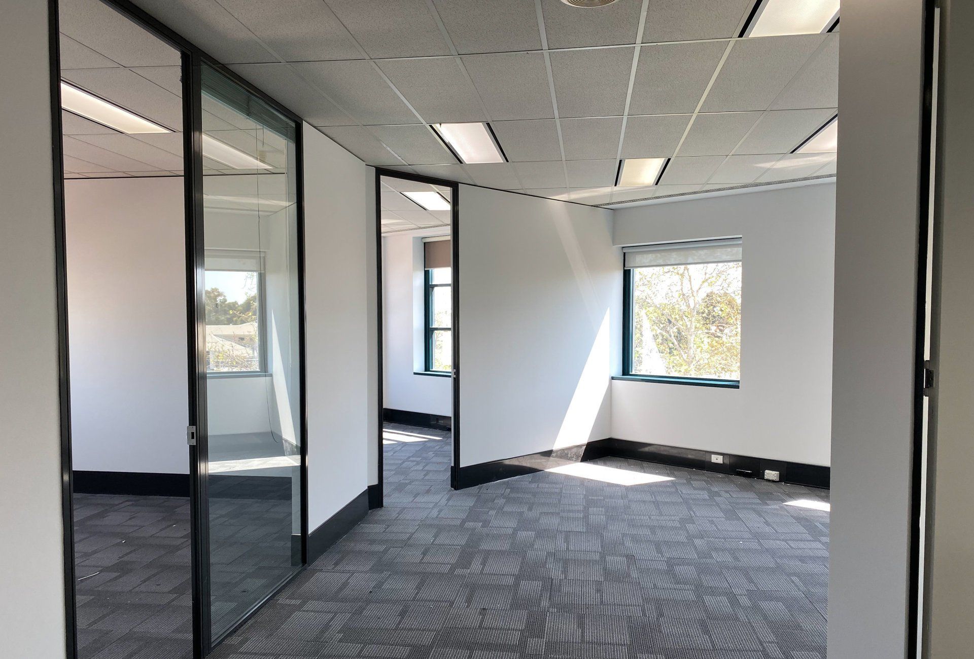 white walls of internal office space painted by ABC Paint & Deco