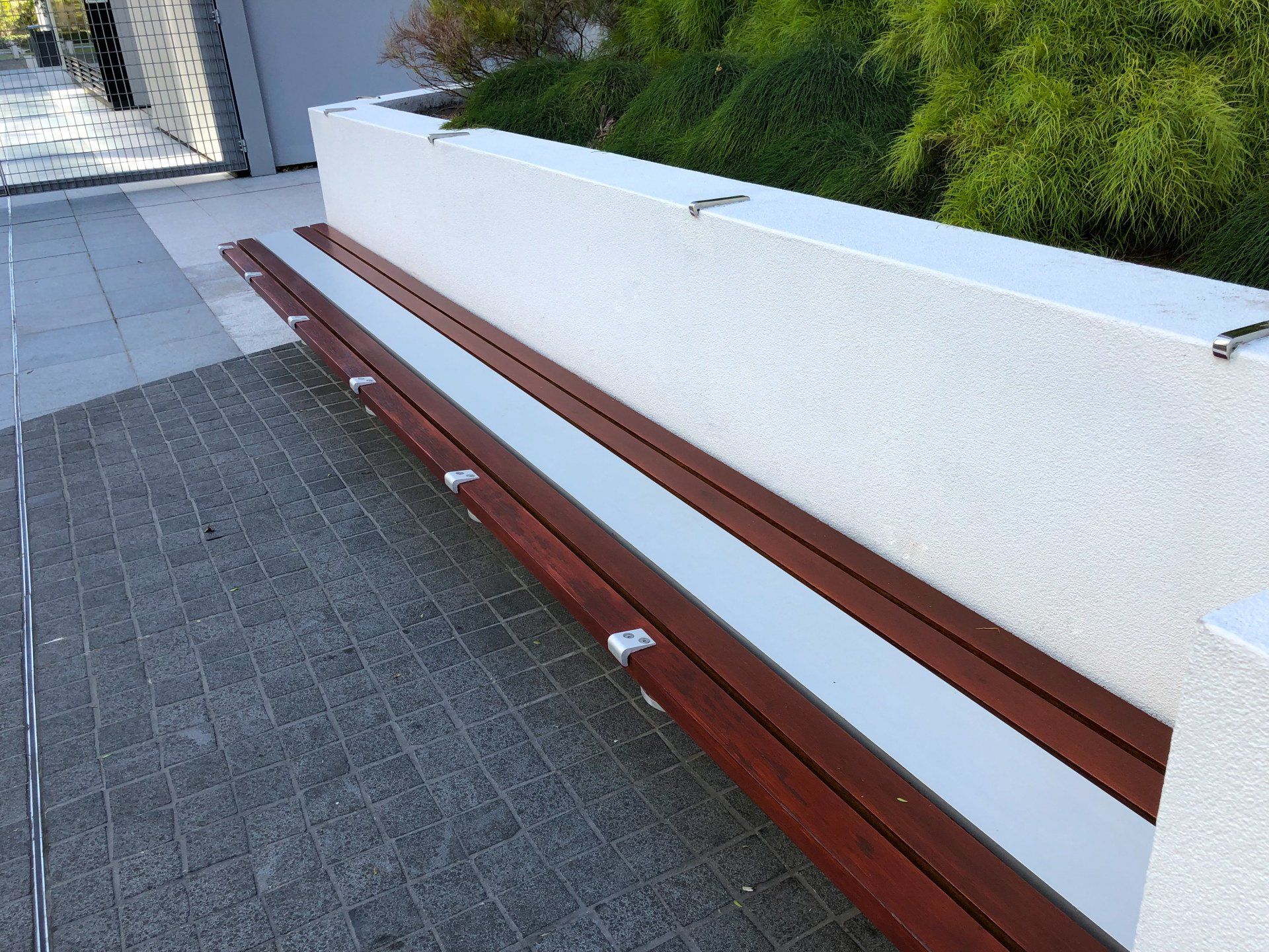 Outdoor park bench varnished by ABC Paint & Deco