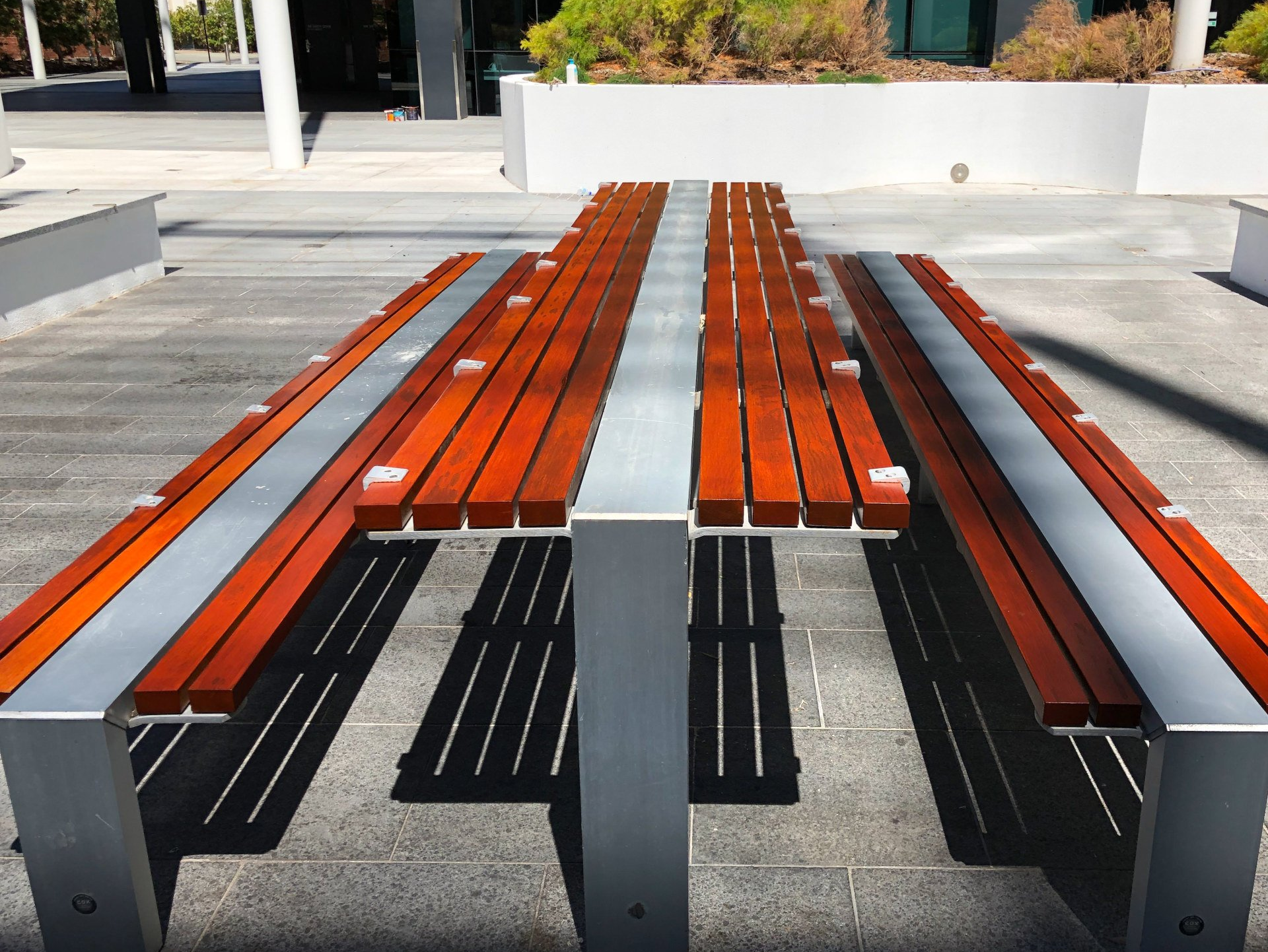 Metal and wooden public bench in Perth