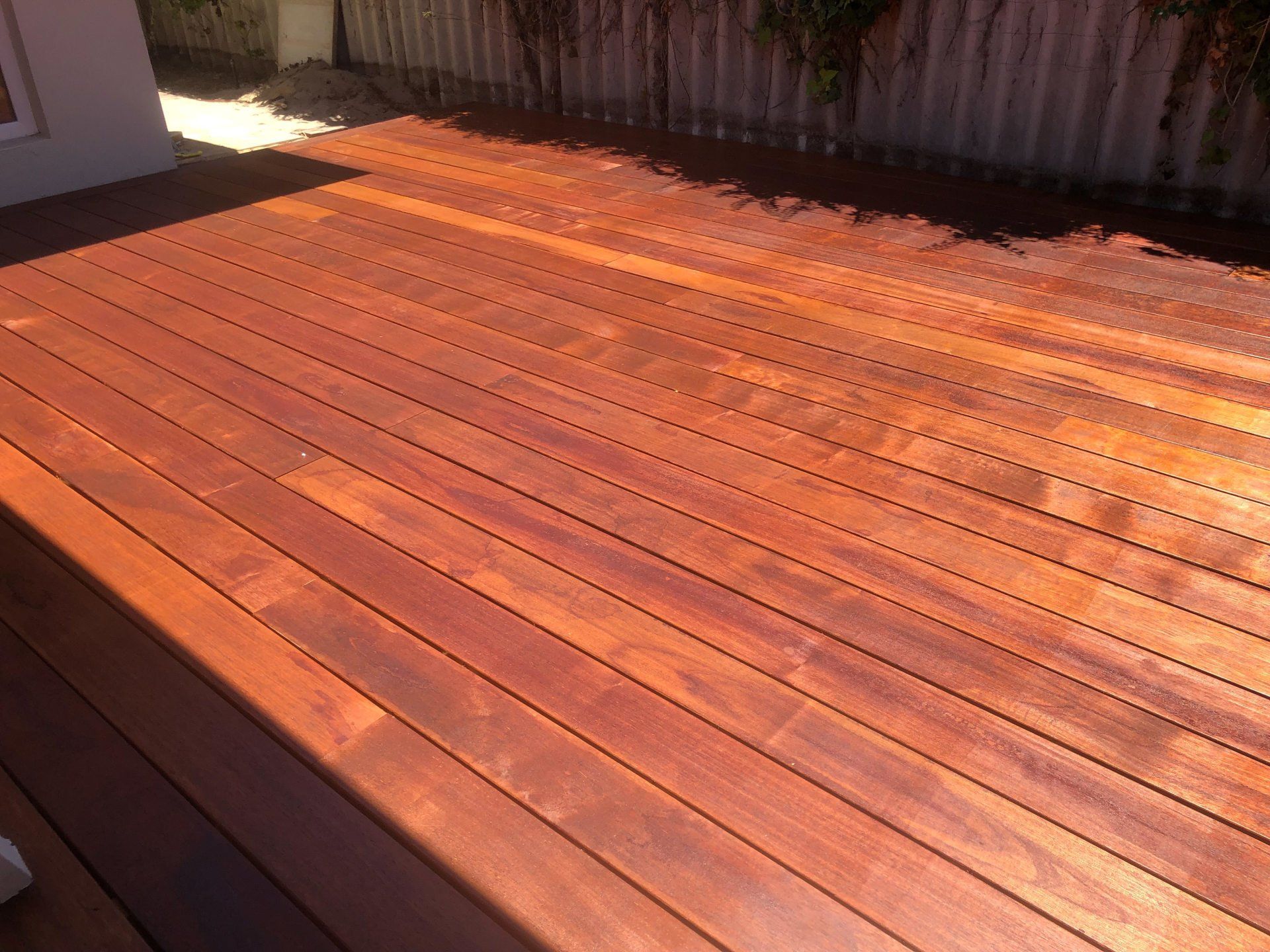 wooden deck painted by ABC Paint & Deco