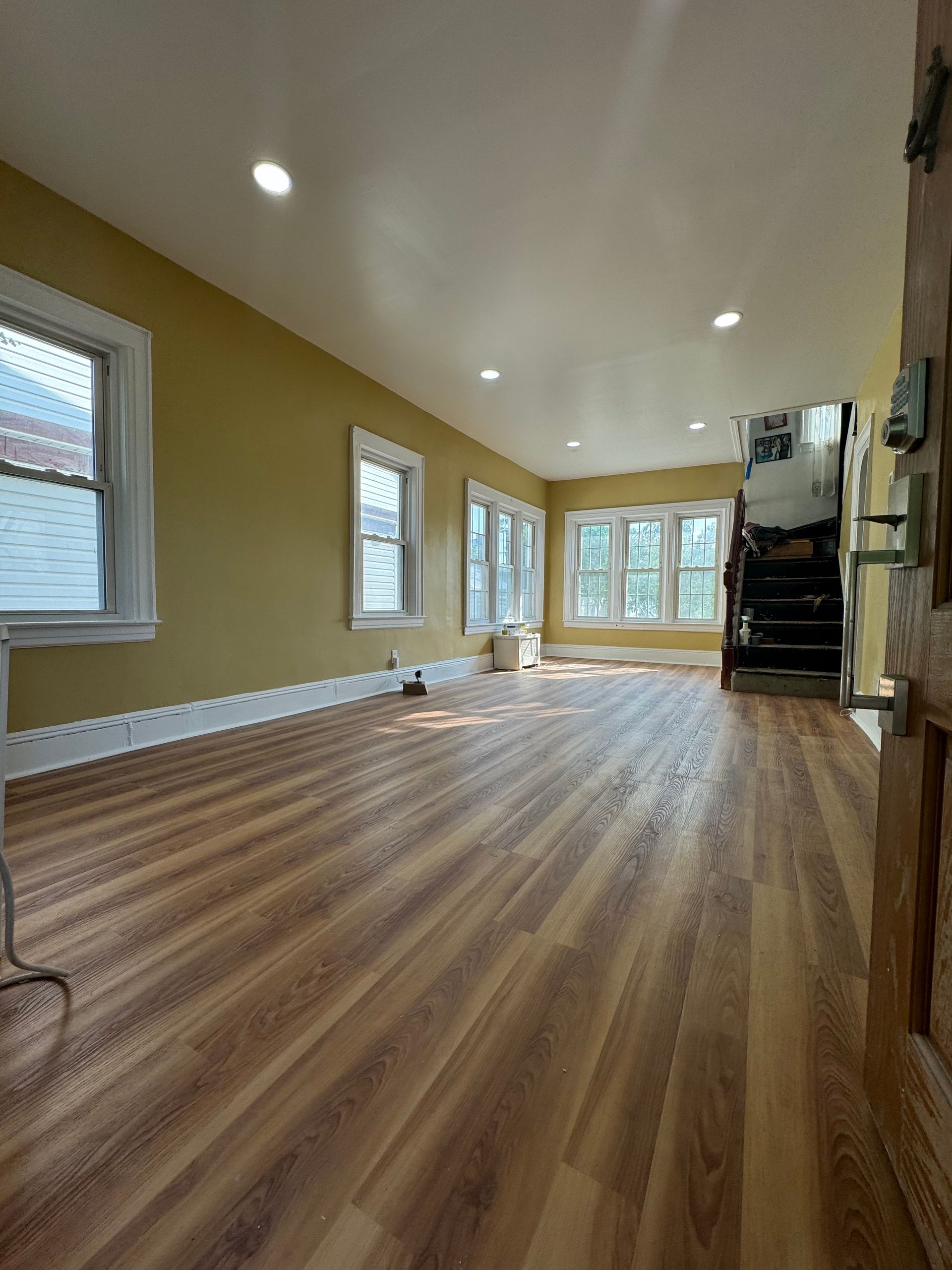 renvoated home with new flooring and new walls by satbir singh 9175151474