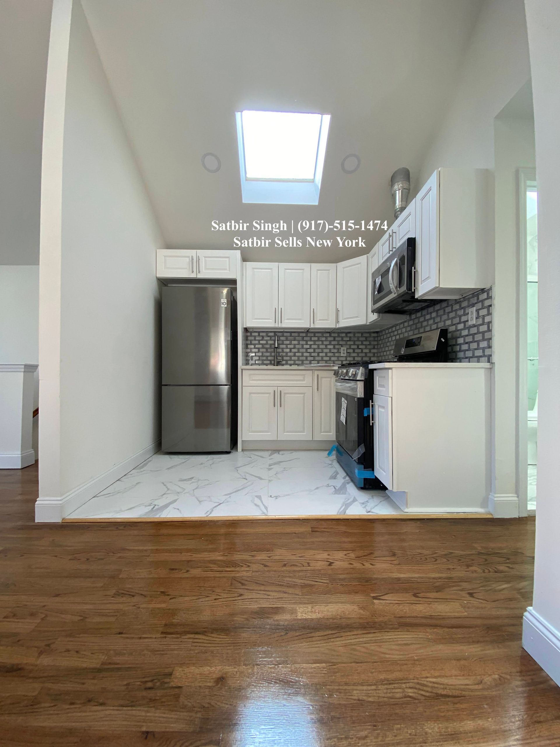 new kitchen recently renovated and a new home for sale by satbir singh in queens ny real estate agent