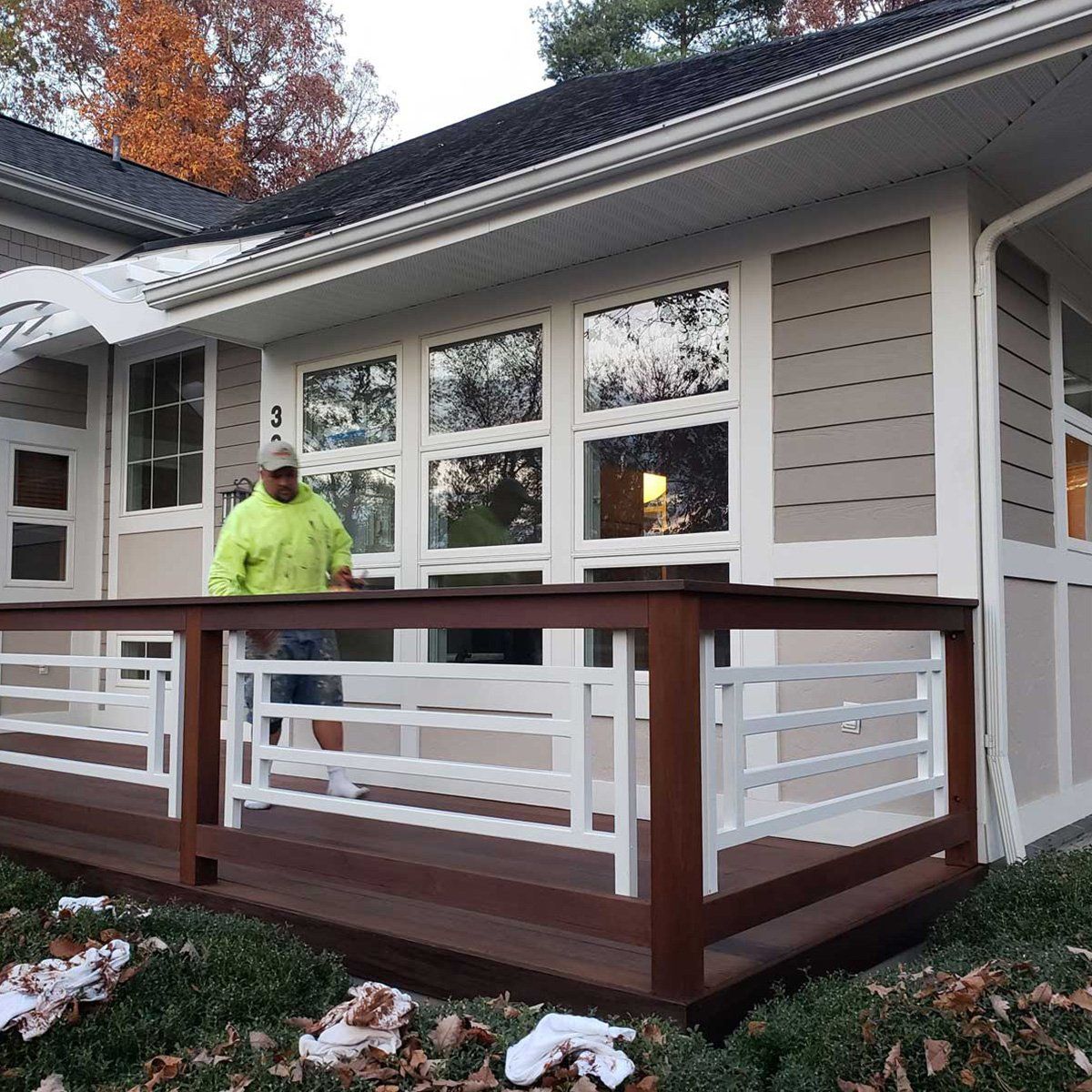 Man Painting the House Deck — Harrisonburg, VA — Xtreme Painting