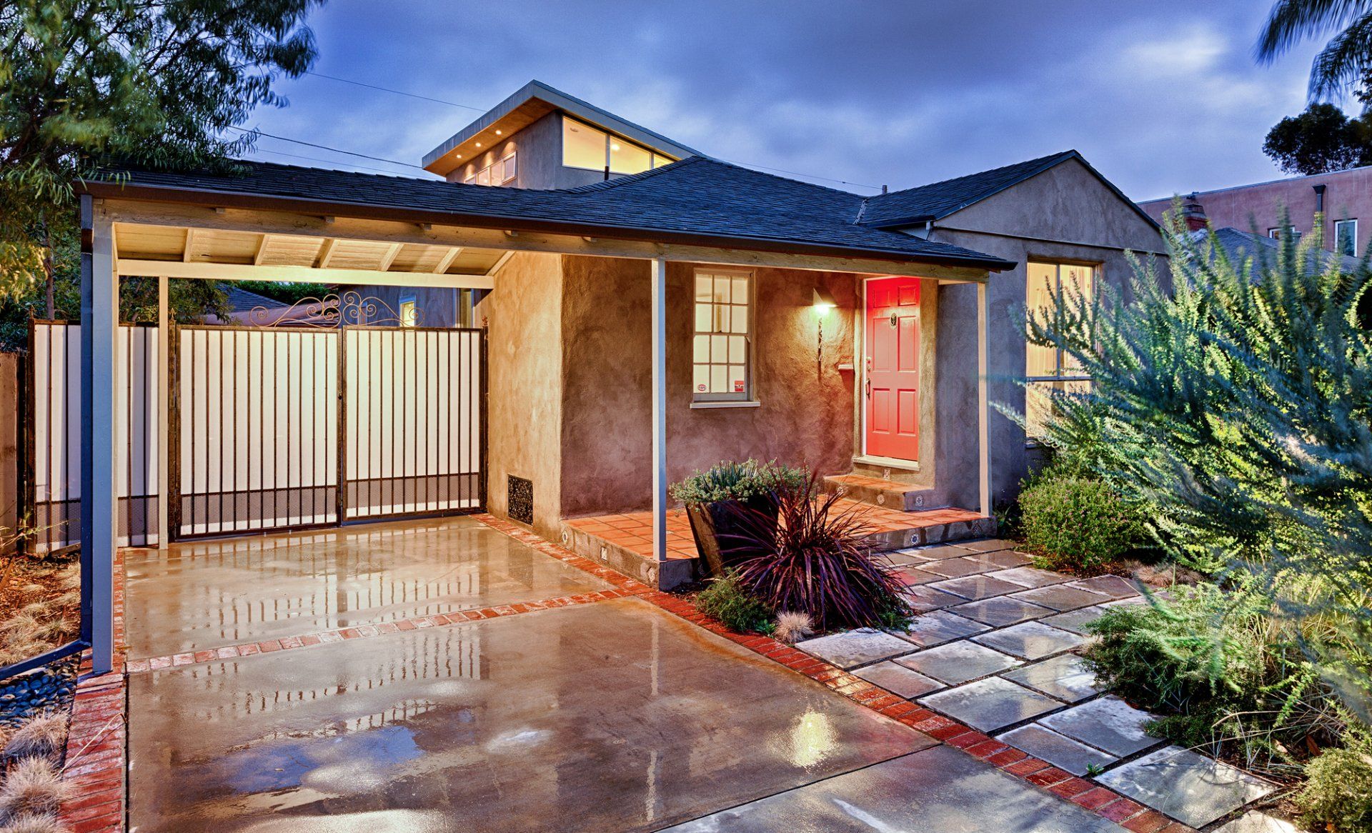 A house with a carport in front of it
