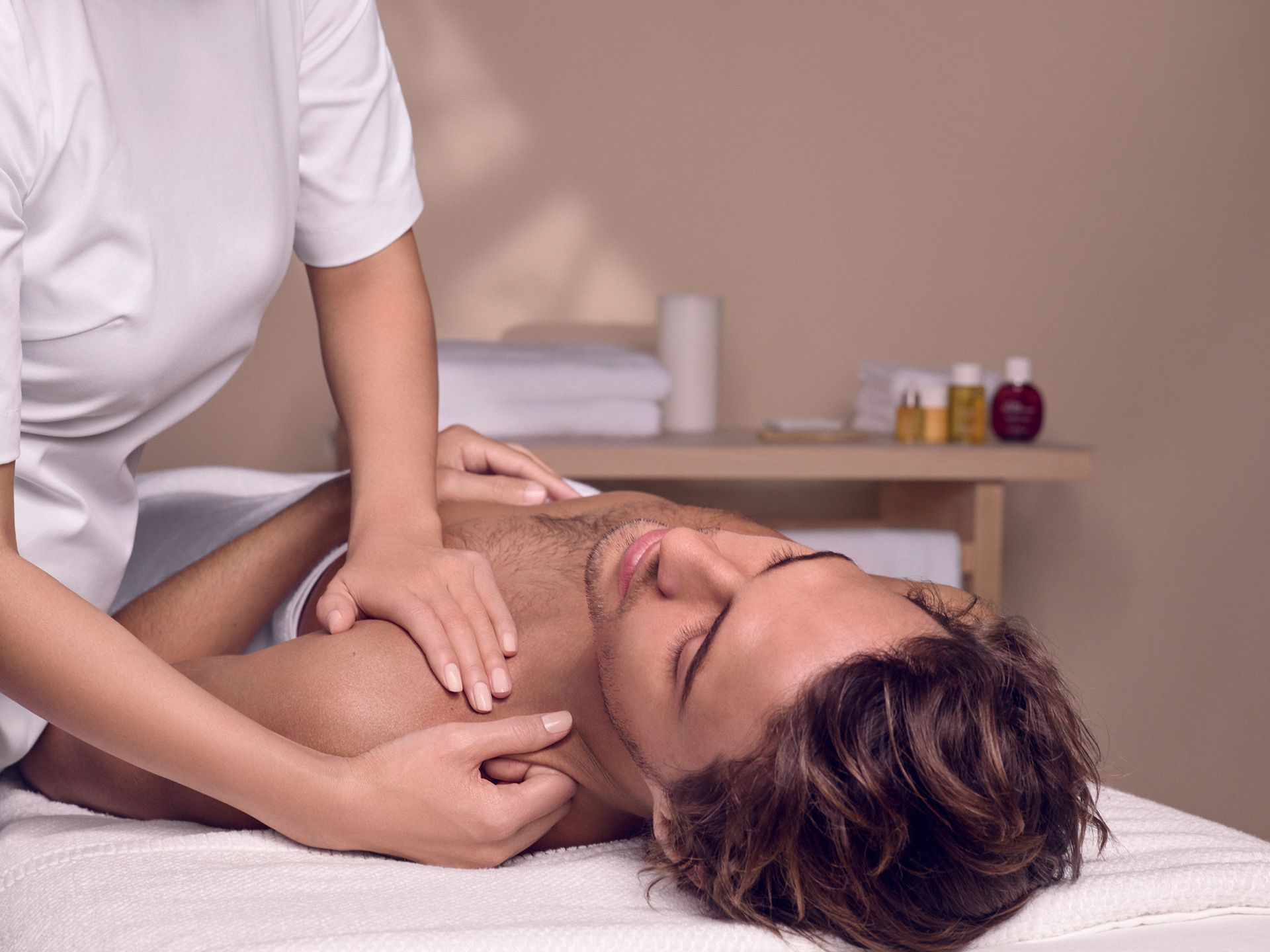 CLARINS massage on male client