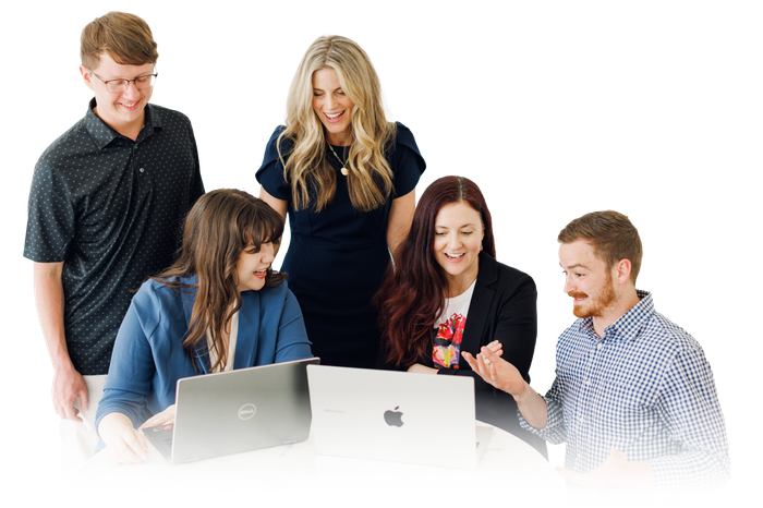 an excited group of young digital marketing experts in a conference room