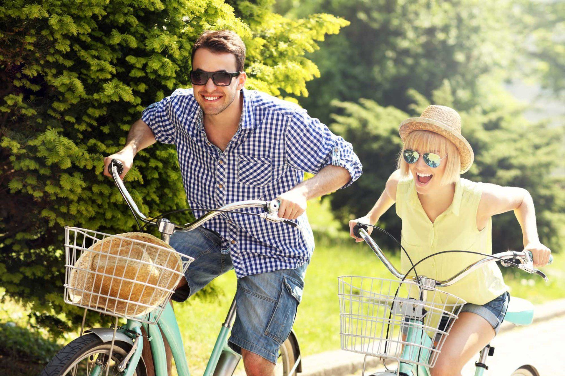 young couple riding bikes