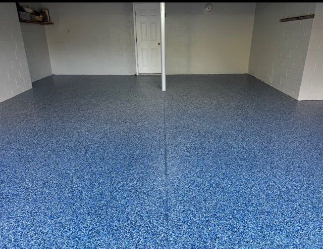 Blue speckled epoxy garage floor.