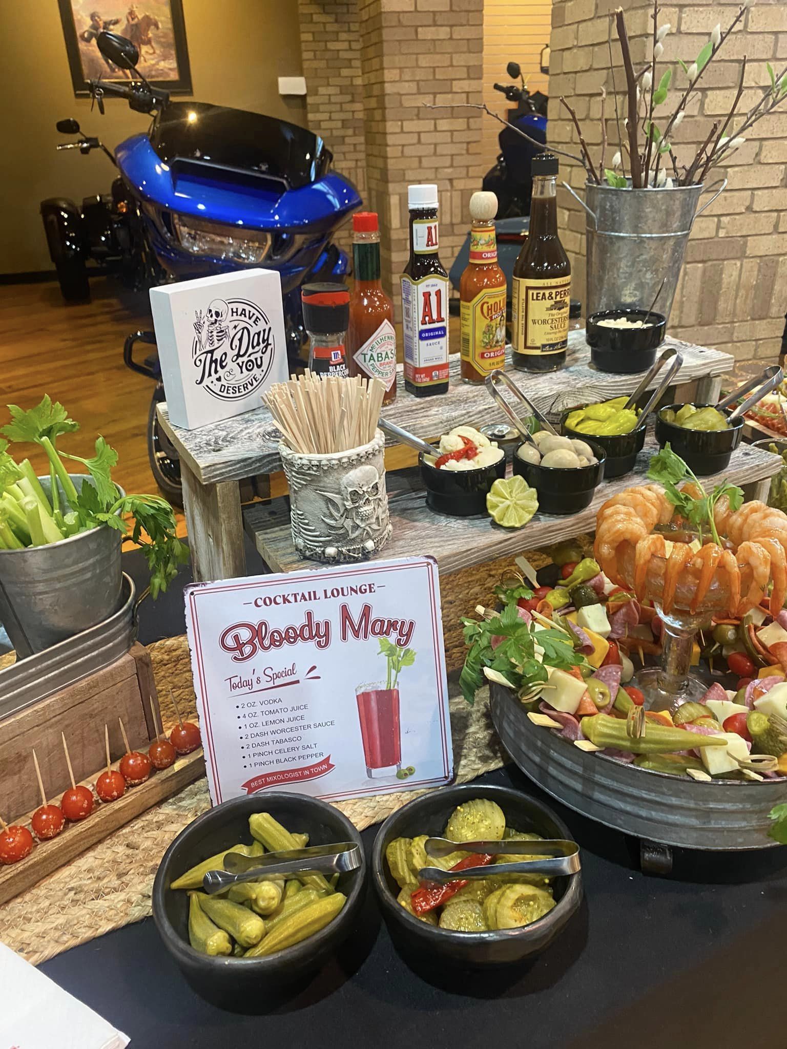 A buffet table filled with lots of food and drinks.