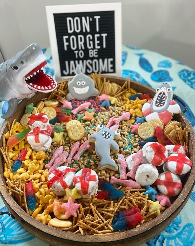 A bowl of food with a sign that says do n't forget to be jawsome