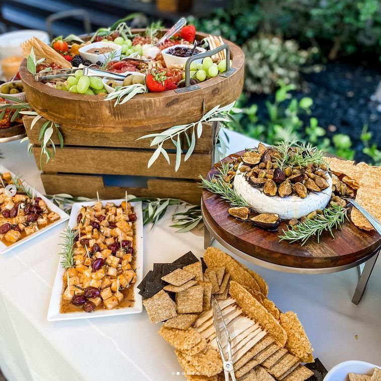 A table topped with plates of food and a bowl of food.