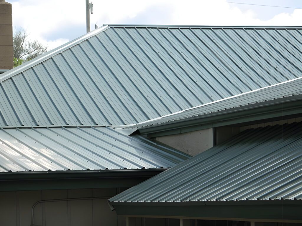 A close up of a metal roof on a house