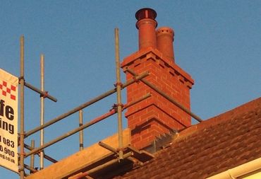 Chimney repair work in progress