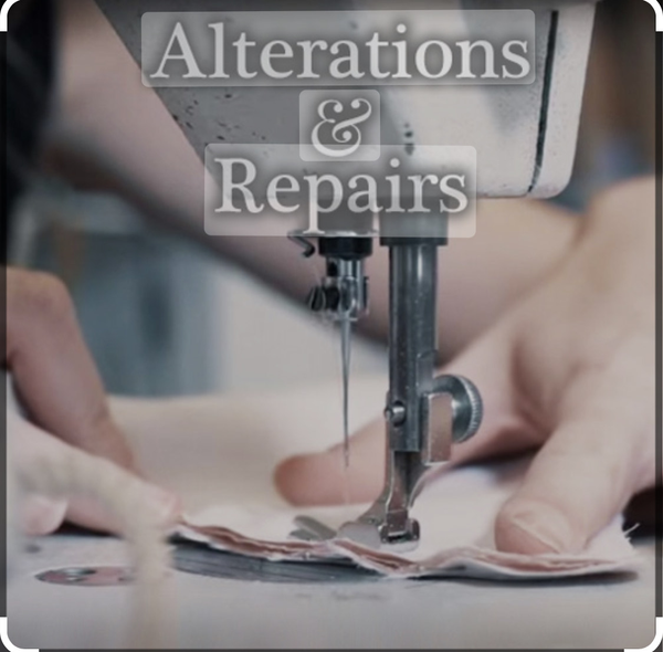 a sewing machine with alterations and repairs written above it