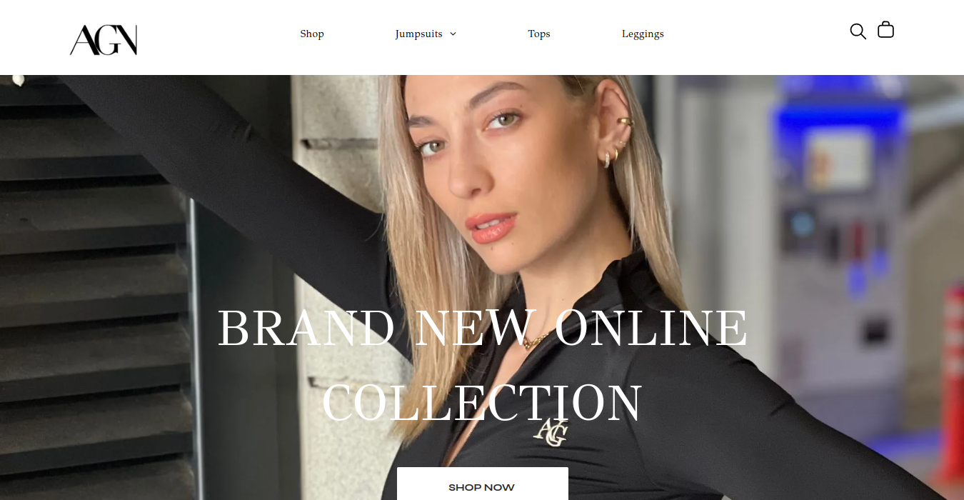 A woman is standing in front of a sign that says brand new online collection.