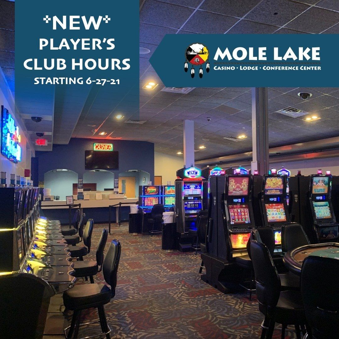 A picture of a casino that says new player 's club hours
