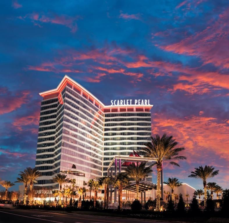 The scarlet pearl hotel is lit up at night