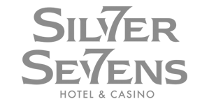 A silver sevens hotel and casino logo on a white background