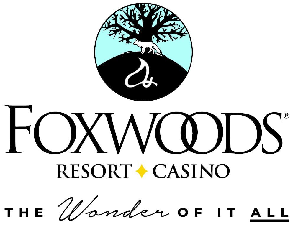 The logo for foxwoods resort and casino has a fox and a tree on it.