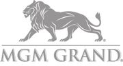 The logo for mgm grand has a lion on it.