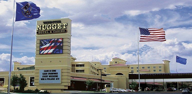 A large building with the word nugget on it