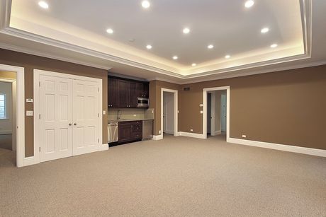 clean and empty house with brown carpet