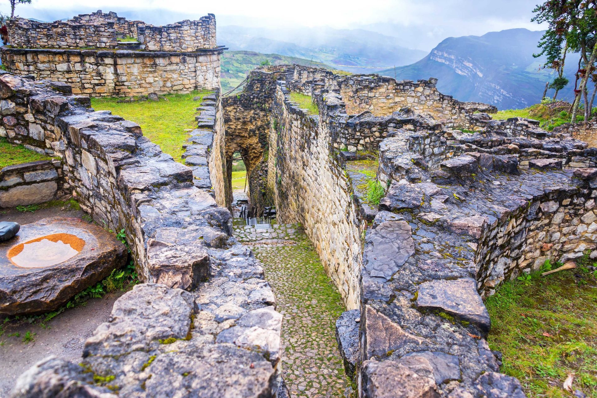 ancient stone ruins, wet