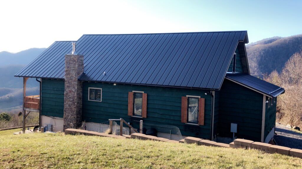 Blue House with Small Deck ─ Canton, North Carolina ─ Shane Willis Construction