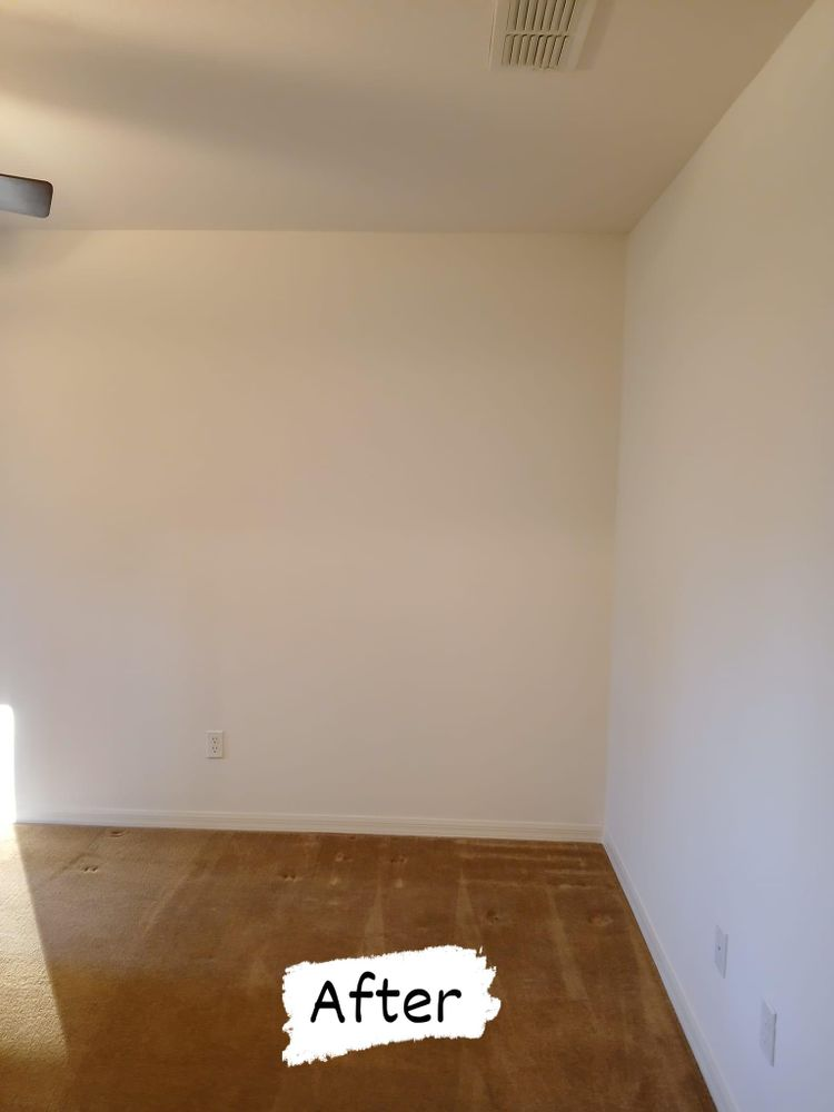 An empty room with white walls and a sign that says after