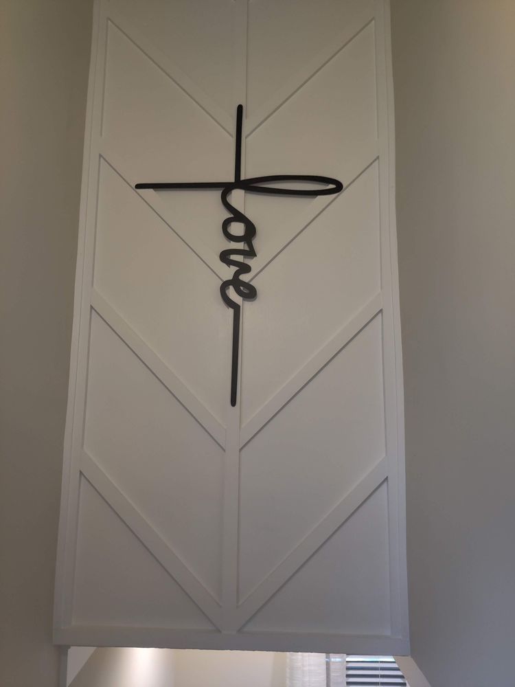 A cross with the word jesus written on it