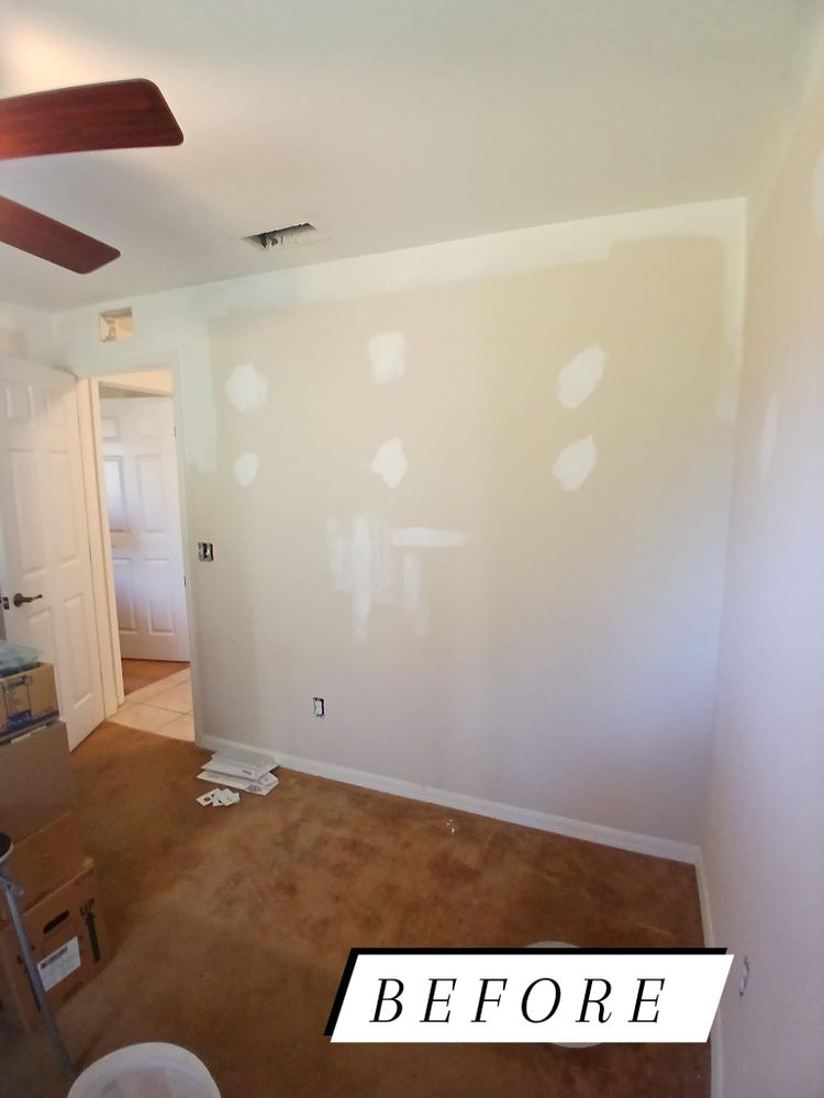A before picture of a room with a ceiling fan