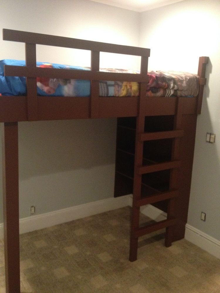 A bunk bed with a ladder in a room