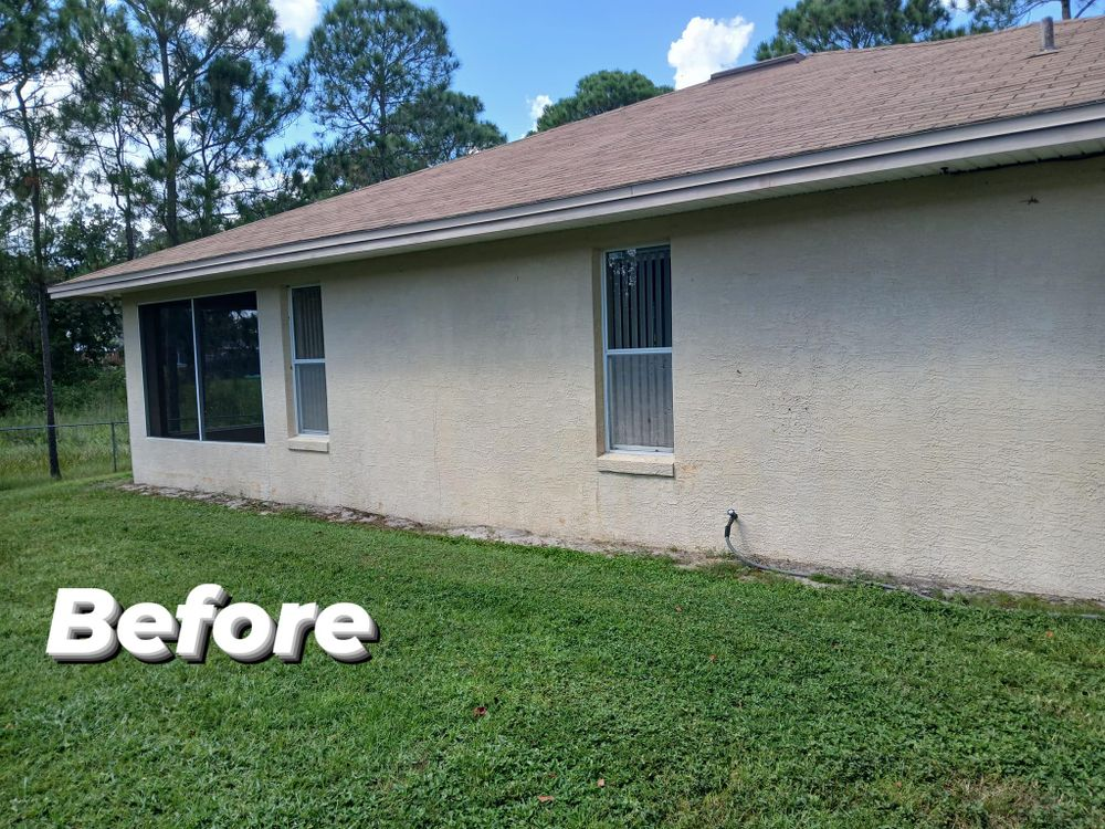 A before picture of a house with a lot of windows