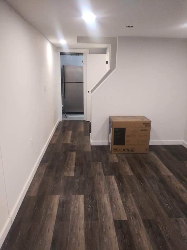There is a box on the floor in the middle of the room
