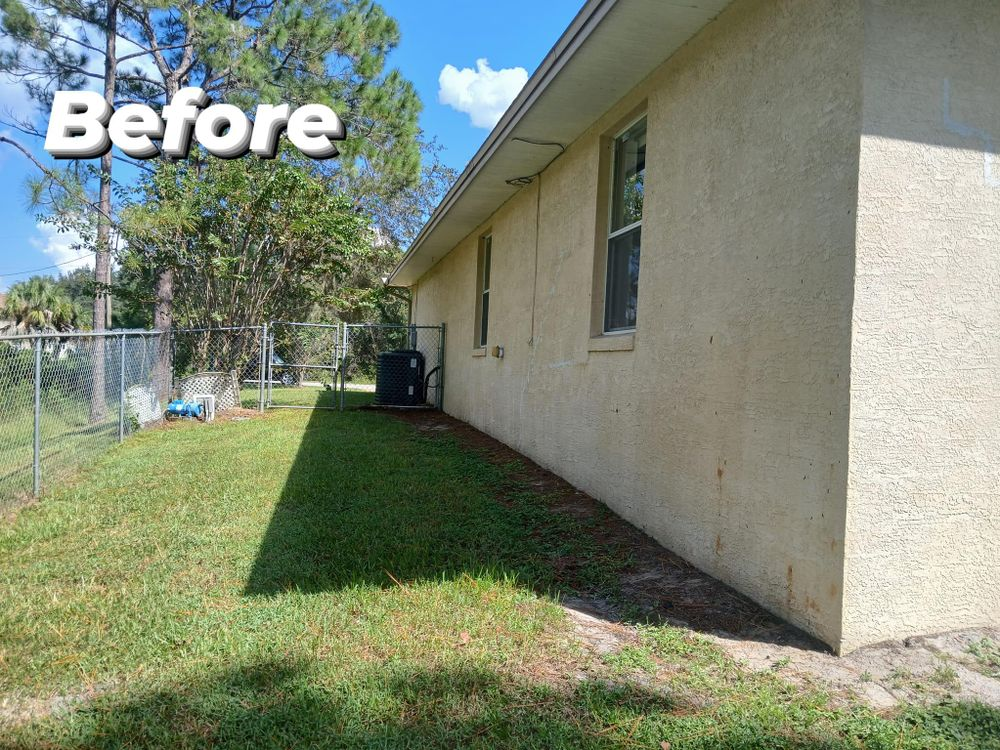 A before picture of a house with a fence in the background