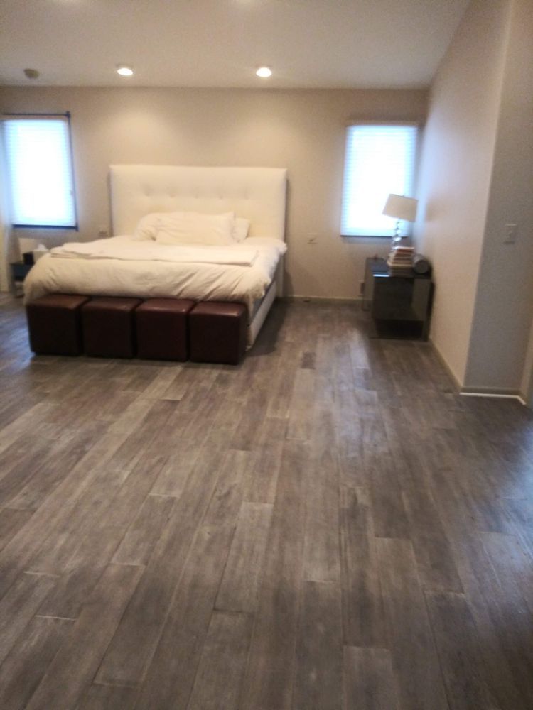 There is a large bed in the middle of the room