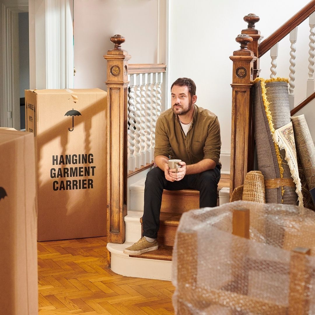 man sitting on staircase