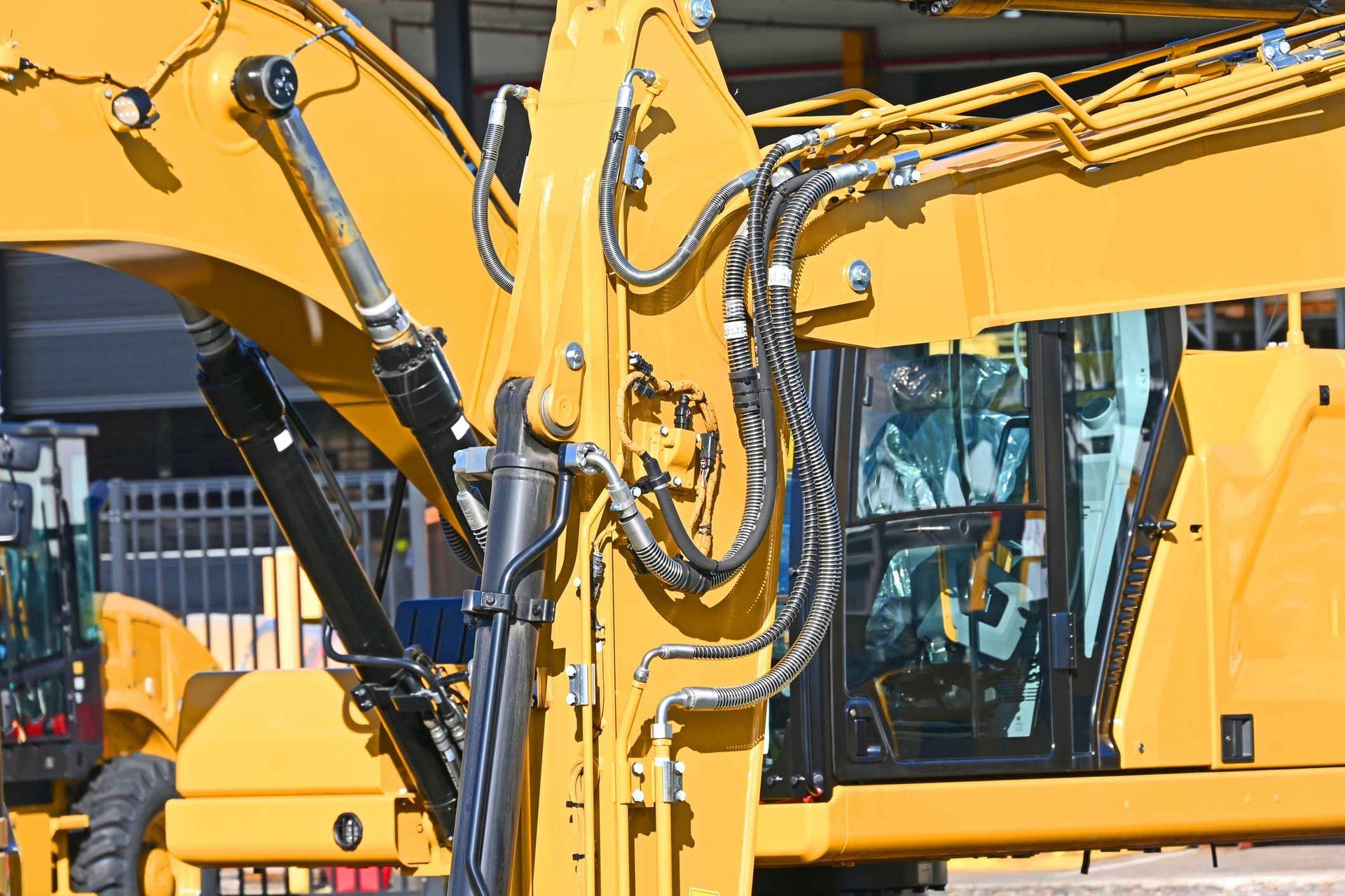 Hydraulic Rams and Hoses on A Yellow Excavator | Hamilton, VIC | Cranix Hydraulics