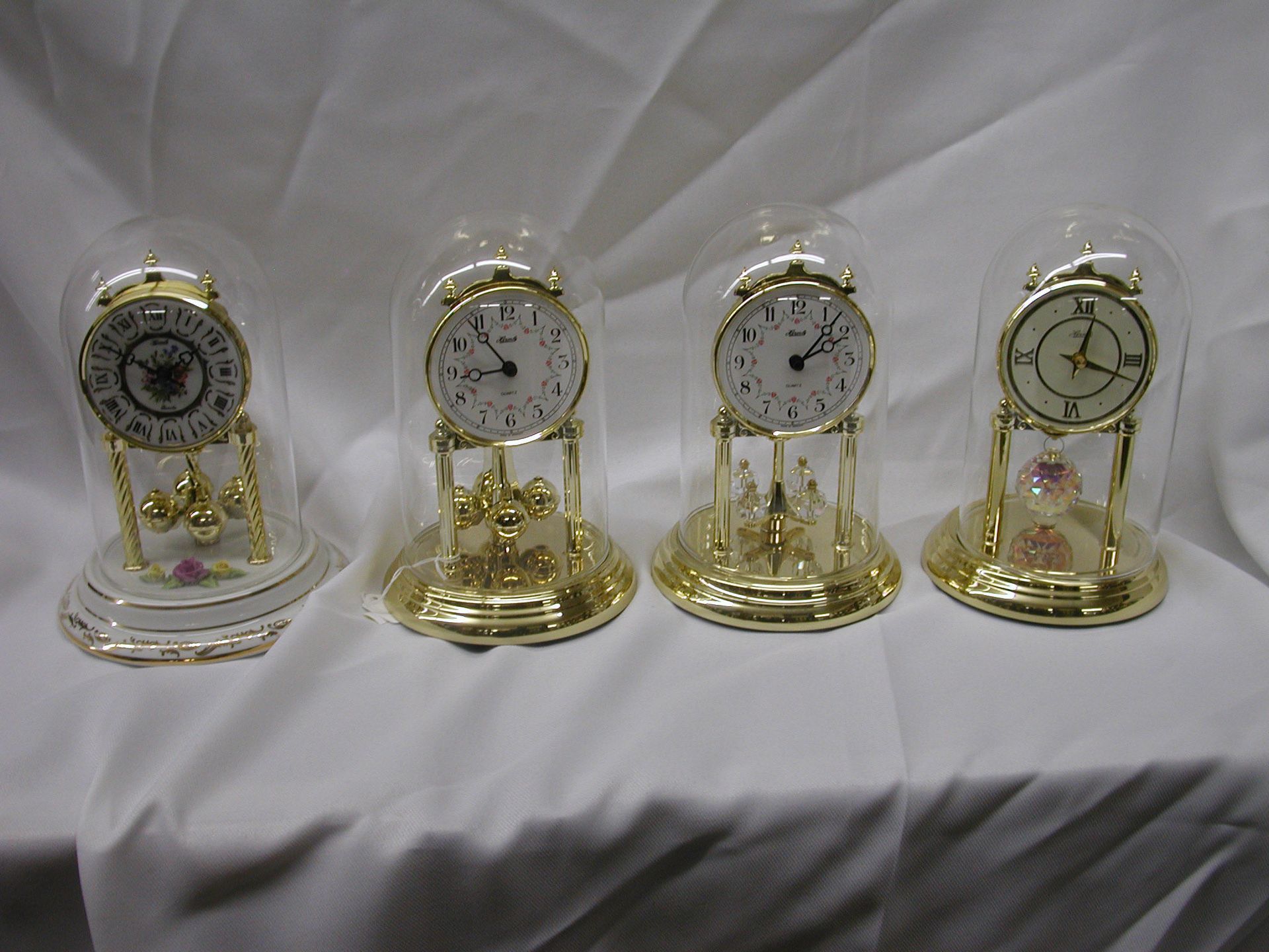 Four Small Clocks | West Allis, WI | Hawkins Clock Center