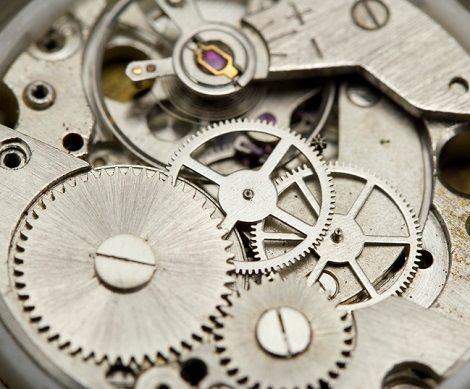Detailed view of clock mechanics with expert use of clock repair supplies for accurate fixing.
