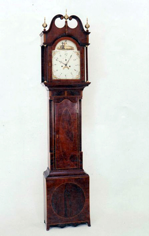 A grandfather clock restoration, emphasizing timeless design. A grandfather clock restoration, emphasizing timeless design.