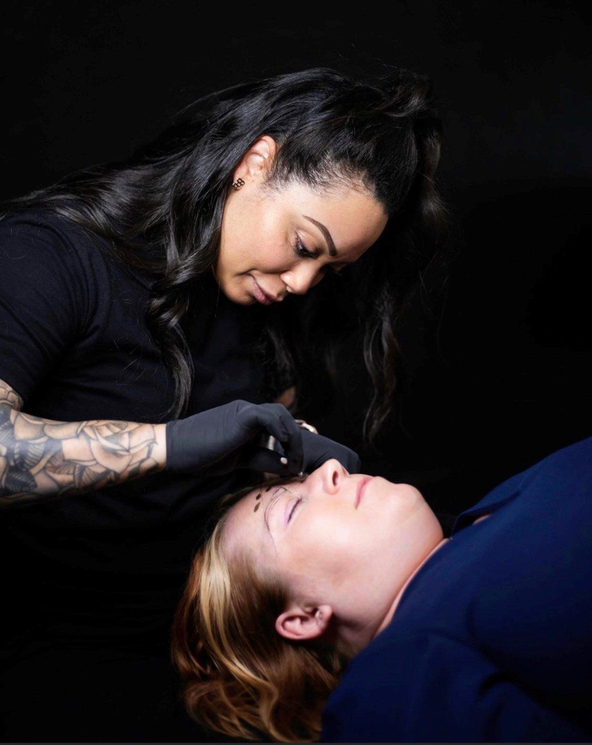 Tattoo Removal — Girl Checking Tattoo in Maryland Heights, MO