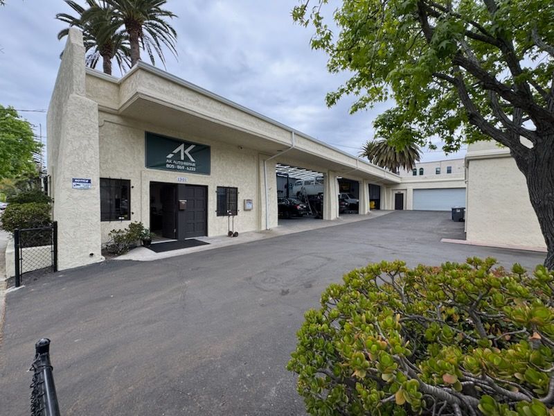 White shop with garages - AK Auto Repair