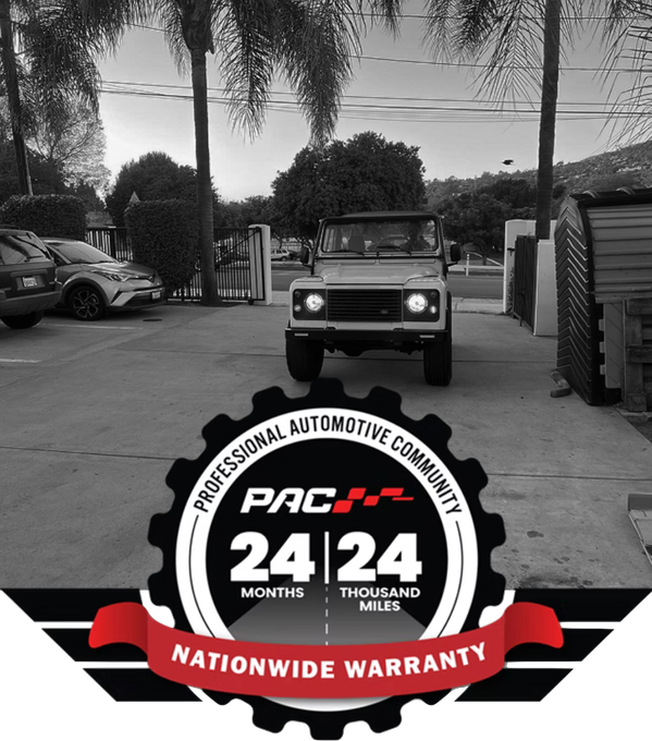 A black and white photo of a jeep parked in a parking lot | AK Auto Repair