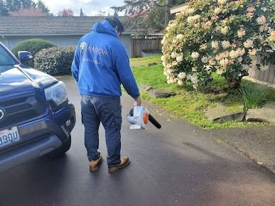 Man Using Leaf Blower Man Using Leaf Blower
