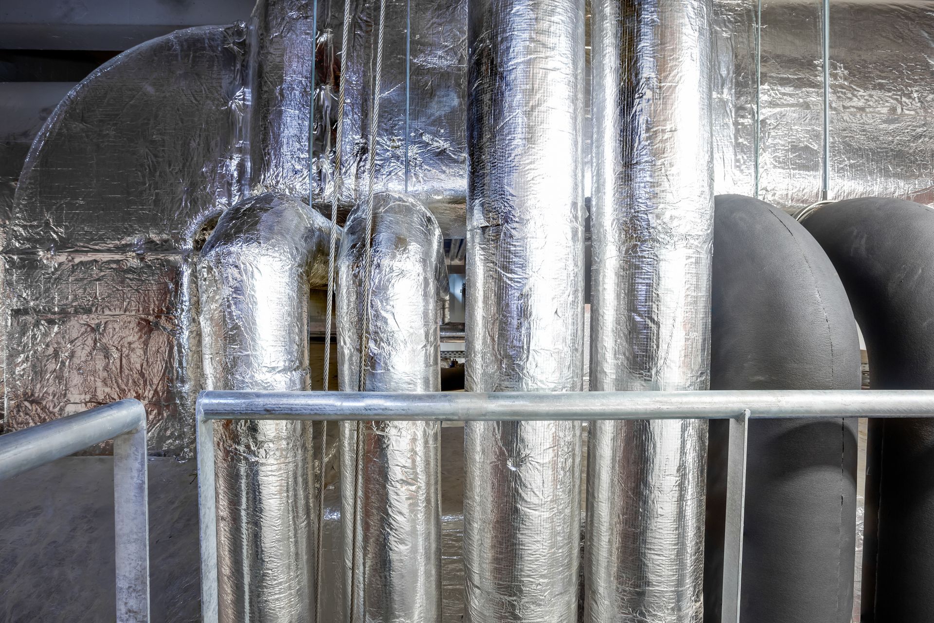 In a technical area, there are boosters for water pipes and ventilation tubes.